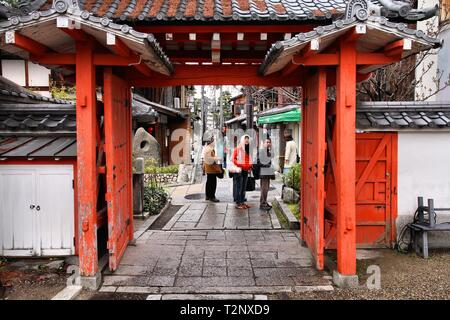 KYOTO, JAPAN - APRIL 14, 2012: People visit old town of Gion district, Kyoto, Japan. Old Kyoto is a UNESCO World Heritage site and was visited by almo Stock Photo