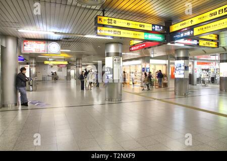 KYOTO, JAPAN - APRIL 14, 2012: People walk at Keihan Railway Station in Kyoto, Japan. Keihan Railway company was founded in 1949 and is among busiest  Stock Photo