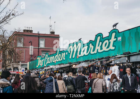 London, UK - March 23, 2019: People walking inside Camden Market, London. Started with 16 stalls in March 1974, Camden Market is one of the busiest re Stock Photo