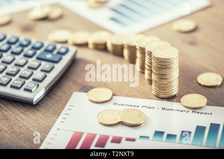 Still life from euro coins with growth efect business plan and calculator. Stock Photo