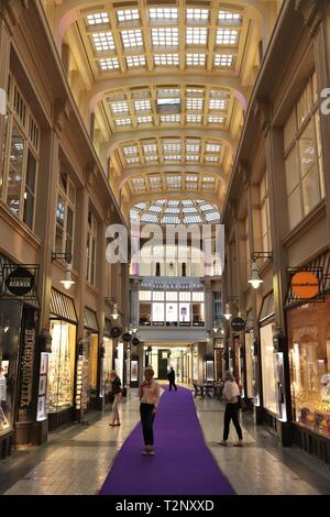 LEIPZIG, GERMANY - MAY 9, 2018: People visit Madler Passage old shopping arcade in Leipzig. The arcade was built over 100 years ago and was result of  Stock Photo