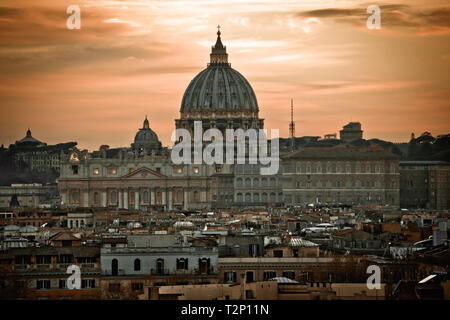 The Papal Basilica of Saint Peter in Vatican dramatic dawn view, Rome landmarks in capital city of Italy Stock Photo