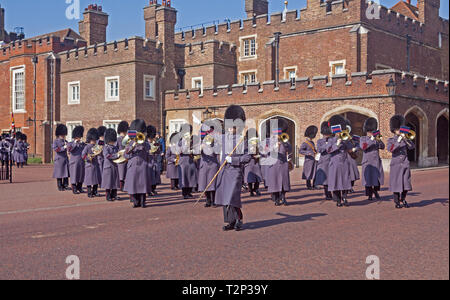 London, Westminster.  The band of the Brigade of Guards leaving St James's Palace following a ceremony in the courtyard. Stock Photo