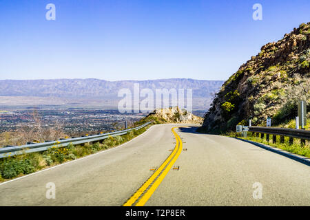 Travelling towards Coachella Valley through Santa Rosa and San Jacinto Mountains National Monument, south California, south California; wildflowers gr Stock Photo