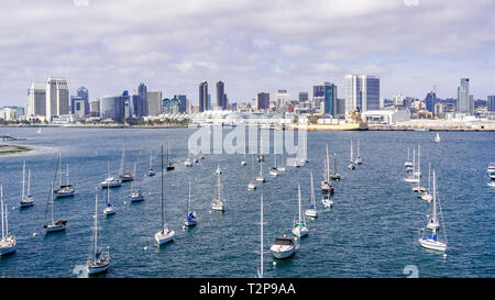 View towards San Diego's downtown area, ships moored in San Diego Bay on the forefront, south California Stock Photo