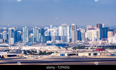 March 19, 2019 San Diego / CA / USA - Panoramic view of the downtown skyline; San Diego Naval Base on Coronado Island visible in the foreground; Fedex Stock Photo
