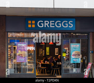 Birmingham, England - March 17 2019:   The Entrance to Greggs bakers on Bull Street Stock Photo