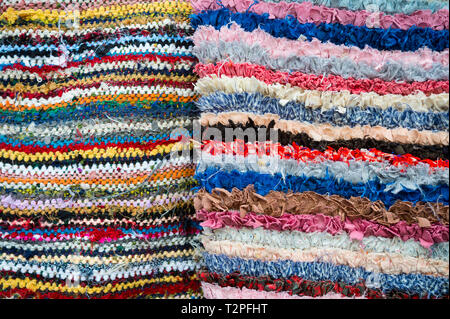 Colorful textile abstract background in a full frame close-up of imperfect layers Stock Photo