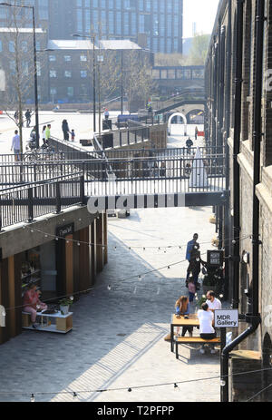 Cafes and shops on trendy Lower Stable Street at Coal Drops Yard, at Kings Cross, London, UK Stock Photo