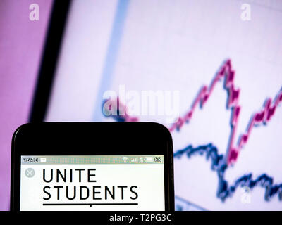 In this photo illustration a Unite Group (Unite Students)  logo seen displayed on a smart phone Stock Photo