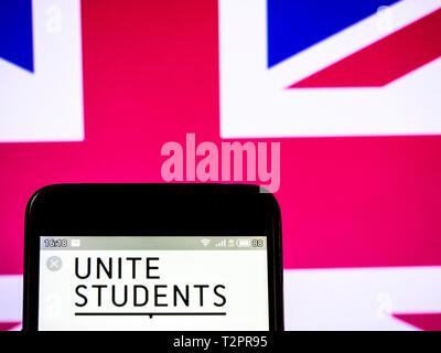 In this photo illustration a Unite Group (Unite Students)  logo seen displayed on a smart phone. Stock Photo