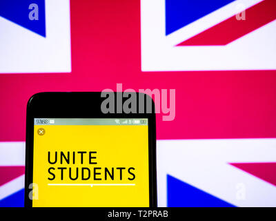 In this photo illustration a Unite Group (Unite Students)  logo seen displayed on a smart phone. Stock Photo