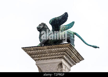 The lion in Piazza San Marco, the symbols of Venice, over white background Stock Photo
