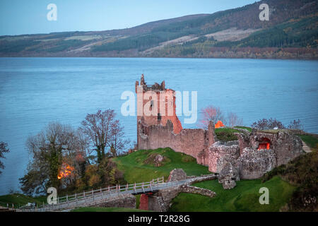 Urquhart Castle sits beside Loch Ness in the Highlands of Scotland near Loch Ness in Scotland, United Kingdom Stock Photo