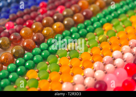 Mixed colors beads close-up made from natural stones or glass marbles Stock Photo