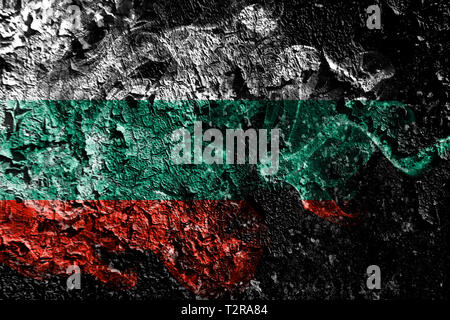 Bulgaria smoky mystical flag on the old dirty wall background Stock Photo