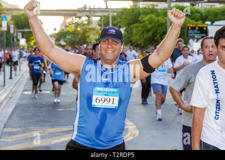 Miami Florida,Bayfront Park,Mercedes Benz Miami Corporate Run,community charity event,runners,servers employee employees worker workers working job jo Stock Photo