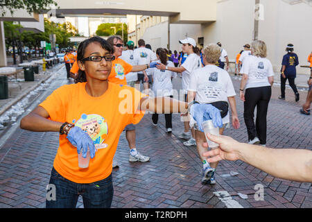 Miami Florida,Bayfront Park,Mercedes Benz Miami Corporate Run,community charity runners,walkers,employee worker workers working,co workers,water stati Stock Photo