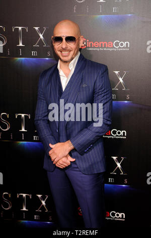 Rapper/Actor Armando Christian Pérez aka Pitbull arrives at the STXfilms presentation red carpet for CinemaCon's 'The State Of The Industry: Past, Present and Future' at The Colosseum at Caesars Palace on April 2, 2019 in Las Vegas, Nevada. Stock Photo