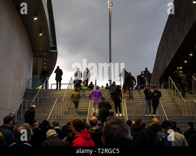 Tottenham Hotspur fans arrive for the first game at the new stadium. Stock Photo