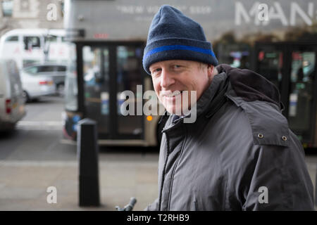 On the day that Prime Minister Theresa May meets with Labour leader Jeremy Corbyn in an attempt to progress Brexit through parliament, controversial Conservative MP, Boris Johnson makes his way to his Whitehall offices in Westminster, on 3rd April 2019, in London, England. Stock Photo