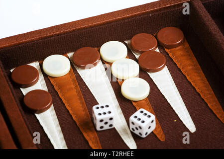 A backgammon game. Pieces and dice. Stock Photo