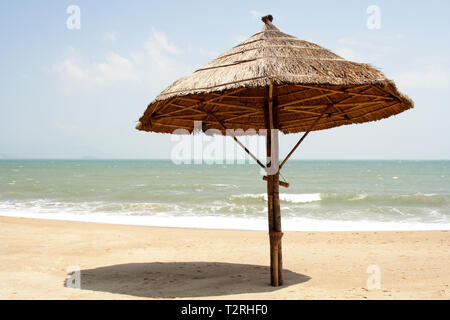 A sunshade on the beach of Nha Trang in Vietnam at the South China Sea Stock Photo