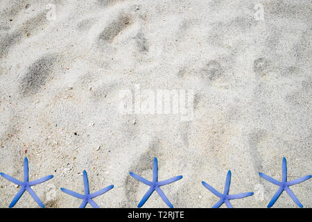 White sand subtle grain smooth with starfish background Stock Photo