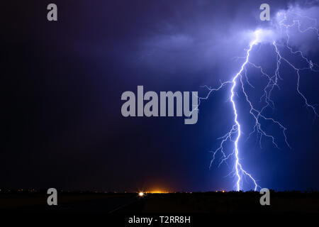 Lightning bolt strike from a monsoon thunderstorm over Four Peaks in ...