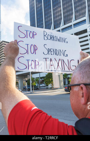 Miami Florida,Biscayne Boulevard,TEA tax party,protest,anti,government,Republican Party,right,poster,protester,free speech,opinion,dissent,man men mal Stock Photo