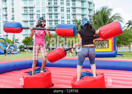 Miami Florida,Marg,Road,aret Pace Park,Easter Eggstravaganza,family families parent parents child children,Hispanic girl girls,youngster,female kids c Stock Photo
