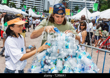 Miami Florida,Bayfront Park,Miami Dade,Miami Goin' Green,eco friendly,green event,exhibitor,Earth Day event,community fair,Asian Asians ethnic immigra Stock Photo