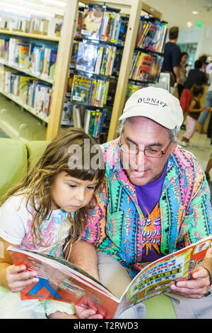 Florida Hollywood,Hollywood Branch Library,Children's BookFest,literature,man men male,girl girls,youngster,female kids children father,parent,parents Stock Photo