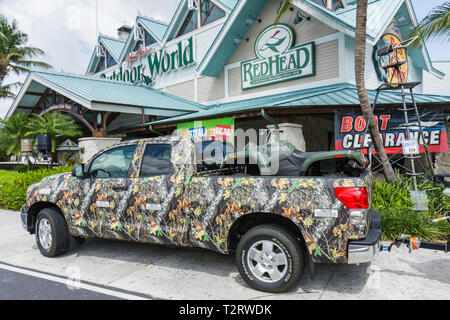 Florida Fort Ft. Lauderdale,Bass Pro Shops,Outdoor World,pickup  truck,custom wrap,forest camouflage,Artic cat cats,ATV,all terrain  vehicle,sporting go Stock Photo - Alamy