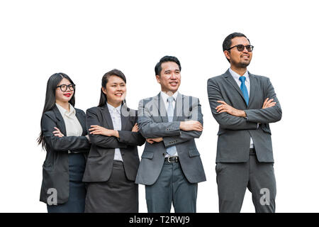 Two businesswomen and two businessmen looking into a distance with smiling faces on white background Stock Photo