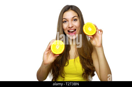 Young happy woman holding oranges Stock Photo