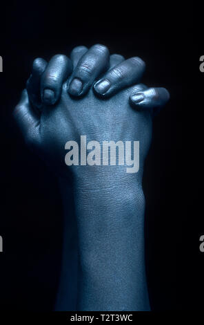 Close up on crossed hands (body painting) Stock Photo