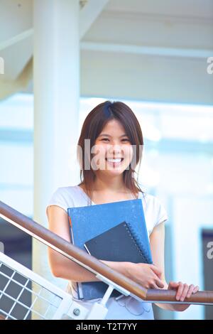 Asian Female Student Studying Stock Photo