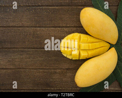 Fresh mango put on the wood table Stock Photo