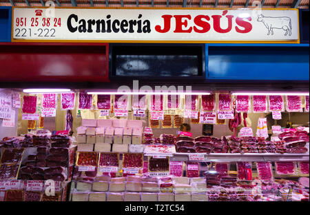 Meat stall or Carniceria, Malaga indoor market or Mercado Central de Atarazanas, Malaga, Andalusia Spain