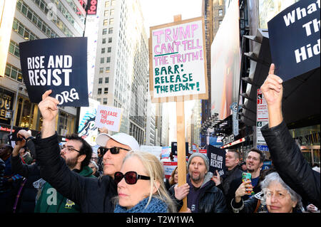 New York, USA. 04th Apr, 2019. Demonstrators seen holding placards asking for the release of the full Mueller report in Times Square, New York City. Credit: SOPA Images Limited/Alamy Live News Stock Photo