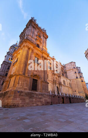 Malaga Cathedral lit at dusk, Malaga old town, Malaga Andalucia Spain Europe Stock Photo