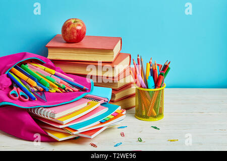Working mess on the table in the student. School and office supplies frame Stock Photo
