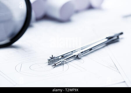 The circulars are on the drawings in the background of the rolls with drawings. 1 September concept postcard, teachers day. selective focus Stock Photo