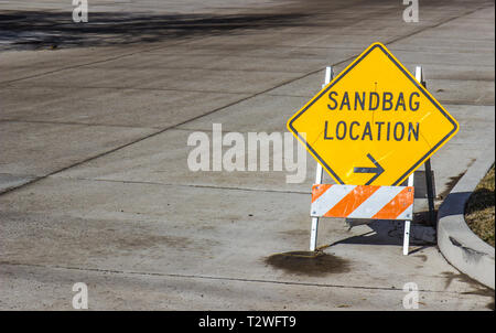 Yellow Diamond Shaped Sandbag Location Sign Stock Photo