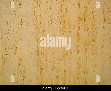 rusty metallic or concrete surface with ginger smudges for backdrop, background wallpaper texture Stock Photo