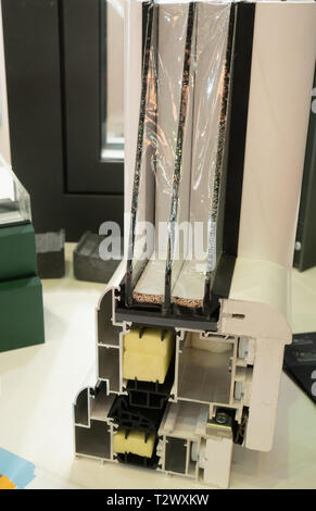 window profile cut. pvc, glass, plastic and aluminum frame shows modern manufacturing technologies Stock Photo