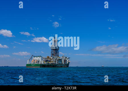 SWAKOPMUND, NAMIBIA - MARCH 24 2018: Large oil drilling ship built in 2011 in South Korea, Ocean Rig Poseidon off coast of Namibia near Walvis Bay Stock Photo