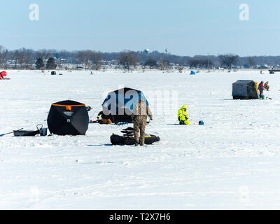 Ice fishing on Monona Bay, Madison, Wisconsin, USA. Stock Photo