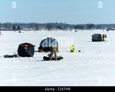 Ice fishing on Monona Bay, Madison, Wisconsin, USA. Stock Photo